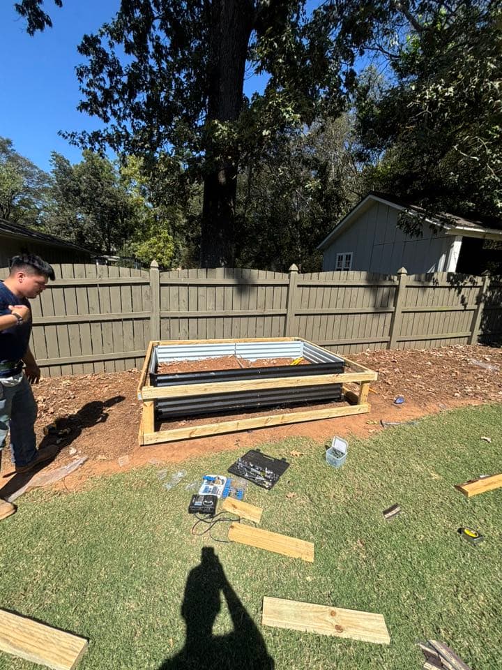 Worker building garden
